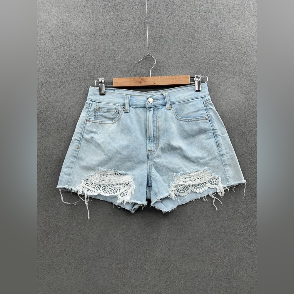 American Eagle Women’s Size 4 Light Wash High Rise Distressed Lace Pocket Shorts
